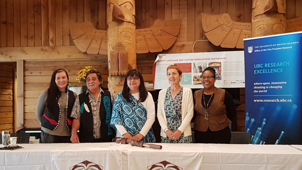 Heiltsuk Council members ’Qátuw̓as (Jessica Brown), Harvey Humchitt and Chief Marilyn Slett, and UBC’s Helen Burt and Lerato Chondoma during the MOU signing ceremony