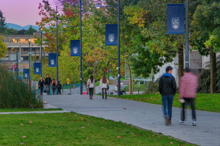 Students walking down University Boulevard